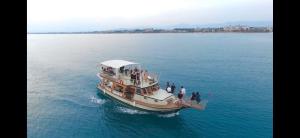 a group of people on a boat in the water at Apollon boat tour in Side