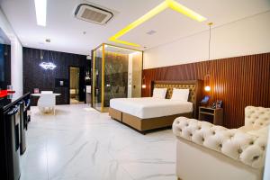 Ένα ή περισσότερα κρεβάτια σε δωμάτιο στο Hotel Dubai