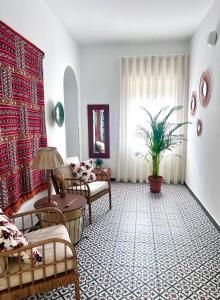 Posezení v ubytování Hostal El Faro
