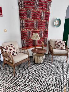 Posezení v ubytování Hostal El Faro