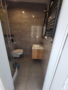 Ένα μπάνιο στο Apartament - STUDIO 6