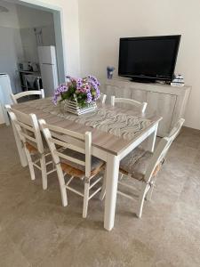 TV a/nebo společenská místnost v ubytování Casa vacanze Salento Sant Isidoro