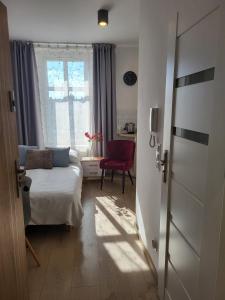Ένα ή περισσότερα κρεβάτια σε δωμάτιο στο Apartament - STUDIO 6