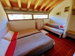 Łóżko lub łóżka w pokoju w obiekcie Hotel Rural Las Encinas