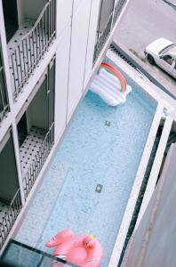 Postel nebo postele na pokoji v ubytování Carrara Hotel Hatyai