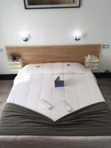 Łóżko lub łóżka w pokoju w obiekcie LH Hotel Excel Roma Montemario