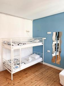 Posteľ alebo postele v izbe v ubytovaní Leon Hostel