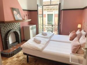 Posteľ alebo postele v izbe v ubytovaní Leon Hostel
