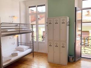 Posteľ alebo postele v izbe v ubytovaní Leon Hostel