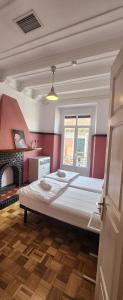 Posteľ alebo postele v izbe v ubytovaní Leon Hostel