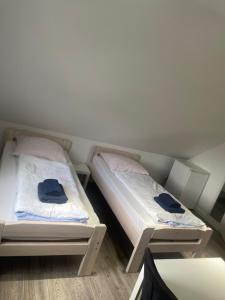 Postel nebo postele na pokoji v ubytování 2 Zimmer Apartment