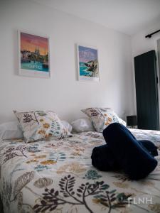 Posteľ alebo postele v izbe v ubytovaní L'appartement de jeanne + 1 fotografia