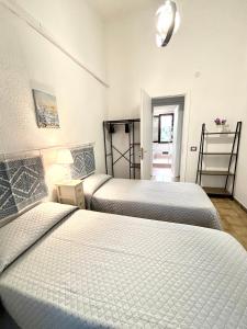 Letto o letti in una camera di Domu e Mari Sud Sardegna