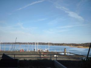 a view of a marina with boats in the water at Schleizauber Ferienwohnung mit Wasserblick und einer großzügigen Terrasse in Schleswig