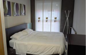 Ein Bett oder Betten in einem Zimmer der Unterkunft Tu refugio de confort en Castellón - parking gratis - factura para empresas