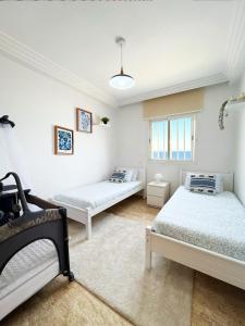 Letto o letti in una camera di Ocean view & sunset in the heart of Rabat 2