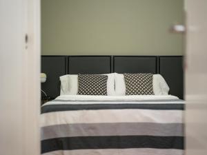Ein Bett oder Betten in einem Zimmer der Unterkunft Feel Canteras