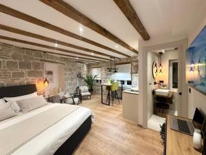 Postel nebo postele na pokoji v ubytování Dani Apartments