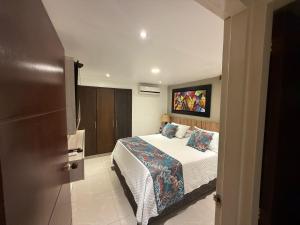 Voodi või voodid majutusasutuse Hotel Ucla Center toas