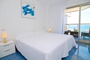 Postel nebo postele na pokoji v ubytování Apartments Latsenko