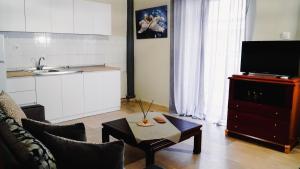 TV a/nebo společenská místnost v ubytování Bastasio House