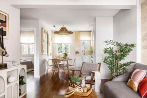 a living room with a couch and a table at Costa Madrid Apartment 2bed in San Martín de Valdeiglesias +27 photos