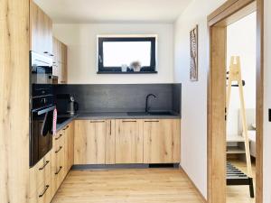 Cucina o angolo cottura di Apartmány Pod Javorem Nová Bystřice