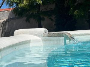 Πισίνα στο ή κοντά στο Casa do Tanque