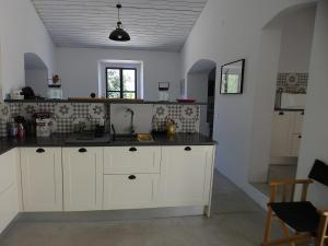 Η κουζίνα ή μικρή κουζίνα στο Casa do Tanque +16 φωτογραφίες