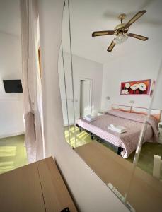 Letto o letti in una camera di Bed&Breakfast Villa Lorena
