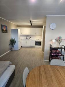 Kuchyň nebo kuchyňský kout v ubytování Gultoppen Tromsø