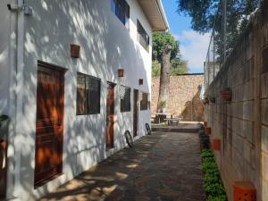 a hallway of a house with a door on the side at Nica Valley in Rivas