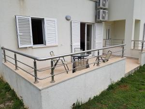Balkón nebo terasa v ubytování Apartments Villa Maslinica