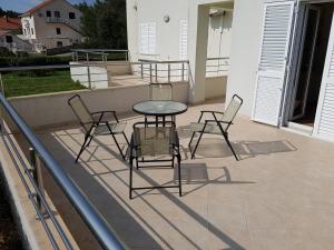 Balkón nebo terasa v ubytování Apartments Villa Maslinica