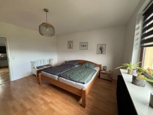 Postel nebo postele na pokoji v ubytování Ferienwohnung Turmfalke