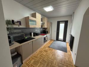 Kuchyň nebo kuchyňský kout v ubytování Ferienwohnung Turmfalke + 10 fotografií