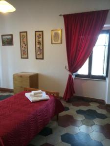 Posteľ alebo postele v izbe v ubytovaní B&B La Staffa