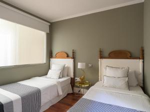 Ein Bett oder Betten in einem Zimmer der Unterkunft Feel Canteras