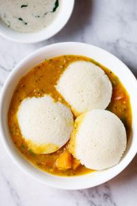 a bowl of soup with three pieces of bread in it at Baga Ocean Way in Baga +62 photos