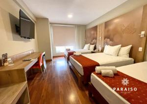 Cama o camas de una habitación en Hoteles Paraiso PIURA