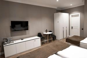 Ένα ή περισσότερα κρεβάτια σε δωμάτιο στο Old Baku Boutique Hotel