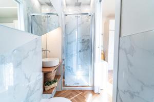 a bathroom with a shower and a sink at BRERA LittleSuite DuomoView in Milan +19 photos