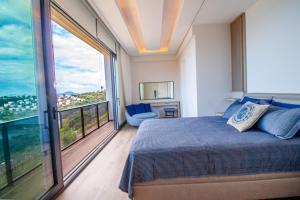 Katil atau katil-katil dalam bilik di Villa Large Royal +23 gambar