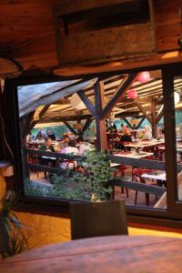 A restaurant or other place to eat at Camping-Hotel de Plein Air Les 2 Bois