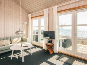 TV a/nebo společenská místnost v ubytování Seaside Panorama Retreat - By Traum Ferienwohnungen