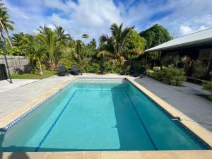 Bazén v ubytování Palm Tree Villas nebo v jeho okolí