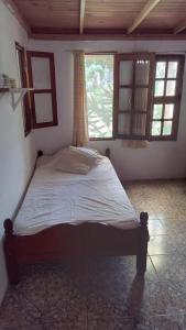 Postel nebo postele na pokoji v ubytování Casa de la Abuela