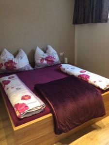 Ένα ή περισσότερα κρεβάτια σε δωμάτιο στο Ferienwohnung Wieser