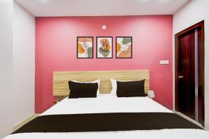 Postel nebo postele na pokoji v ubytování Hotel O Friendly Stay + 21 fotografií
