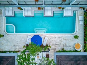 Bazén v ubytování Cipta Hotel Uluwatu nebo v jeho okolí